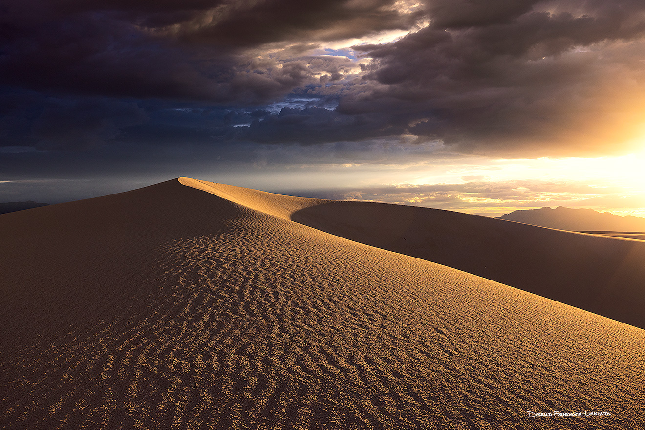 Scenic photograph of a sunset at White Dunes National Park, New Mexico. - New Mexico Picture
